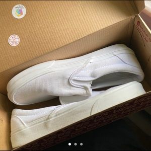 White slip on vans